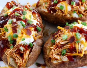 Slow Cooker BBQ Chicken Loaded Baked Potatoes